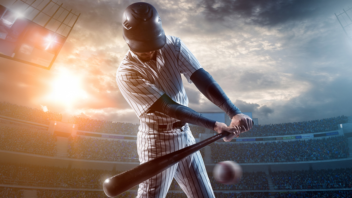 Action shot of person playing baseball.