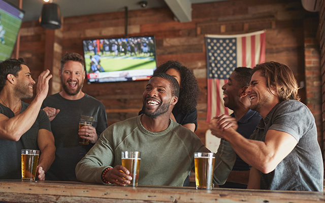Watching football game at a bar
