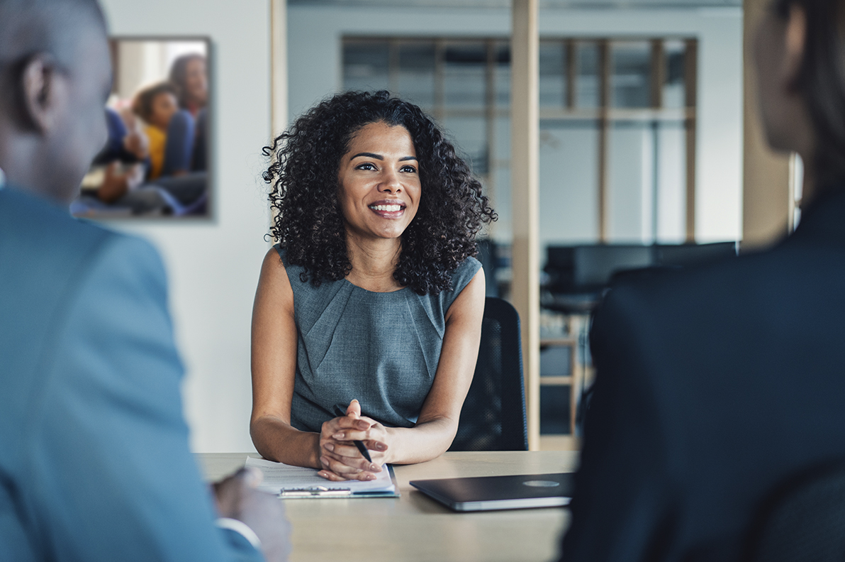 Couple sitting with financial advisor
